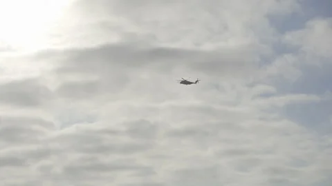 Helicopter Flies Over Water At The Beach Stock Footage 167867443