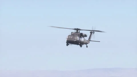 The helicopter flies in the sky. Stock Footage 142032348