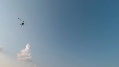 Helicopter Flies Slow Motion Stock Footage 162145517