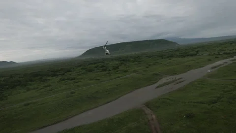 Helicopter flight against the backdrop of nature. Footage. Drone footage of a Vidéo 254387068