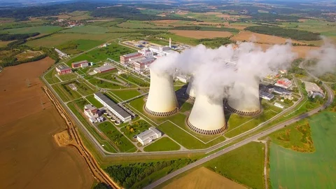 Helicopter flight around to nuclear power plant. Video stock 116985353