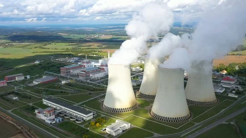 Helicopter flight around to nuclear power plant. Stock Footage 116986494