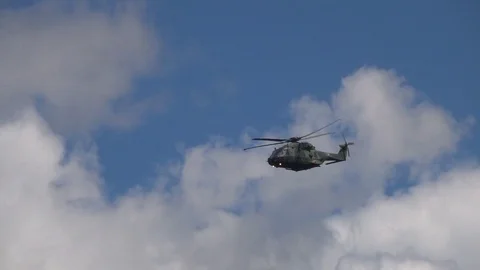 Helicopter flight in blue sky Stock Footage 104036068