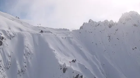 Helicopter flight over the Alps Video stock 220752289