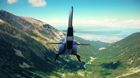 Helicopter flight over the mountains 스톡 동영상 122341609