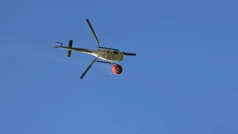Helicopter in flight Stock Photos