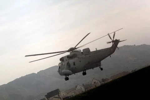 Helicopter in flight Stock Photos