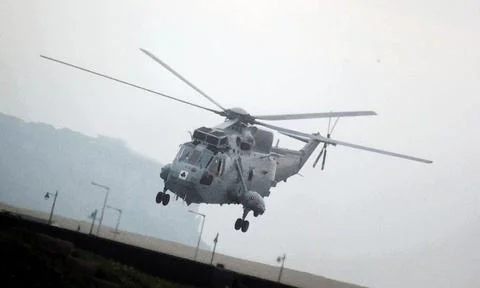 Helicopter in flight Stock Photos