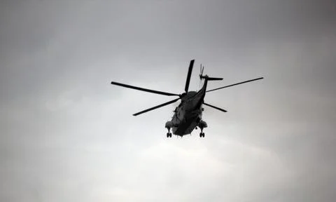 Helicopter in flight Stock Photos