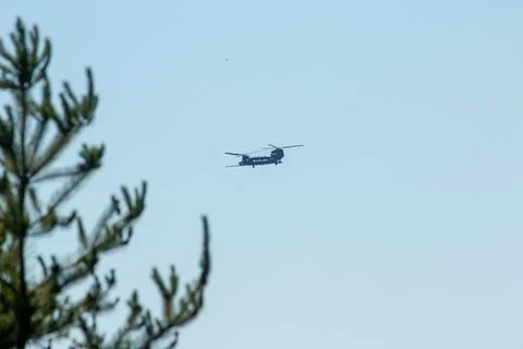 A helicopter in flight Stock Photos