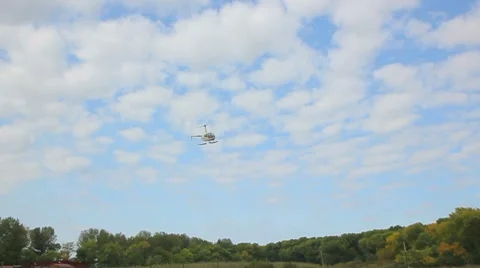 Helicopter fly in the blue sky Stock Footage 8725393