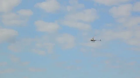 Helicopter fly in the blue sky Stock Footage 8726509