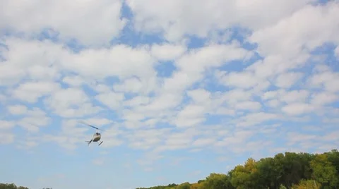 Helicopter fly in the blue sky Stock Footage 8731020