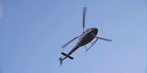 Helicopter Fly Over slow motion Stock Footage