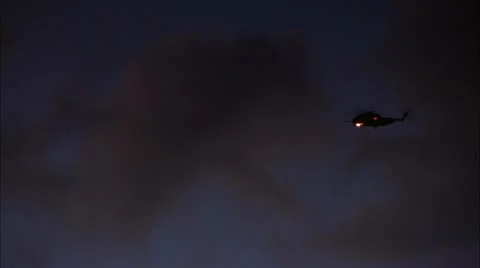 Helicopter flyby at night Stock Footage