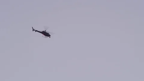 HELICOPTER FLYING BY 1 Stock Footage