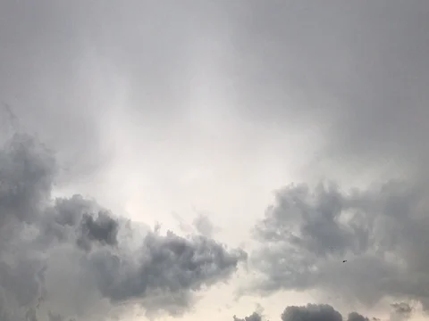 Helicopter Flying Around Dark Clouds 스톡 동영상 78012775