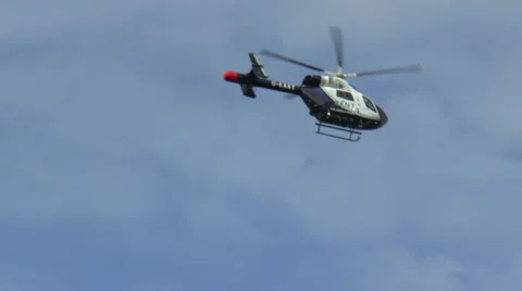 Helicopter Flying Away from Camera Stock-Footage 67613259