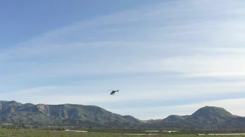 Helicopter flying away takeoff skyline Stock Footage 308666653