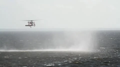 Helicopter flying close to the water Stock Footage 10866231