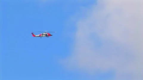 Helicopter flying into clouds Stock Footage 61894122