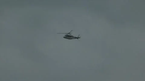 Helicopter Flying on Cloudy Day Stock-Footage 10886594