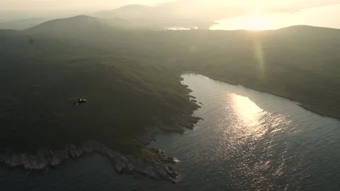 Helicopter flying during sunset Stock Footage 143965678