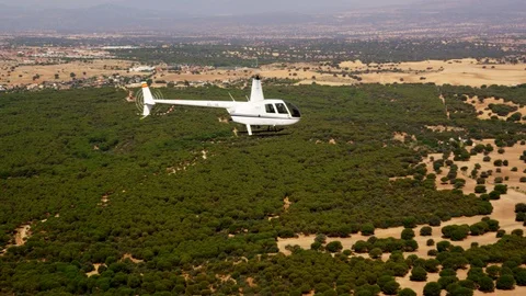 Helicopter, Flying, Forest, Mid-Air, Side View, Wide Shot, 10 Seconds Or Stock Footage 95820575