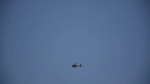 Helicopter flying at low altitude Stock Footage 81935463