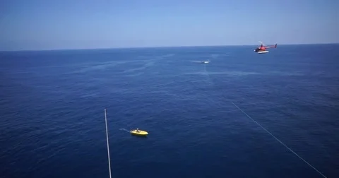 Helicopter Flying in ocean Stock Footage 81494360
