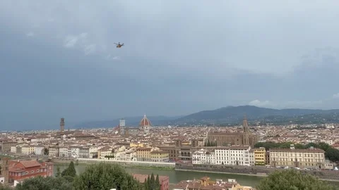 Helicopter flying over Arno river in Florence, Italy 库存影片 346503558
