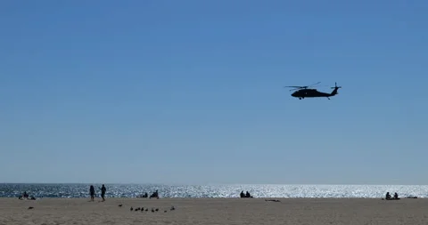 Helicopter flying over the beach Stock Footage 137622921