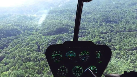 Helicopter flying over a forest 스톡 동영상 73806610