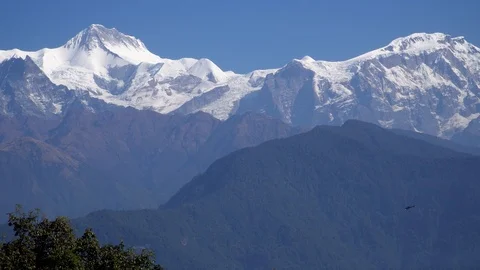 Helicopter Flying Over Himalayan Mountain Range Video stock 99217111