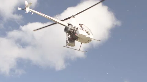 Helicopter flying over landscape Video stock 65885969