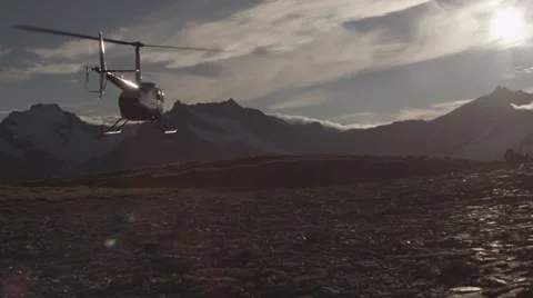 Helicopter flying over landscape Stock Footage 65885982