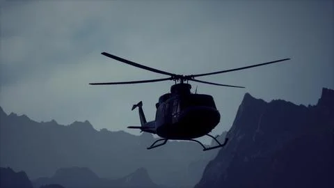 A helicopter is flying over a mountain range Ilustração Stock