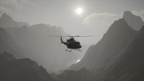 A helicopter is flying over a mountain range Ilustração Stock