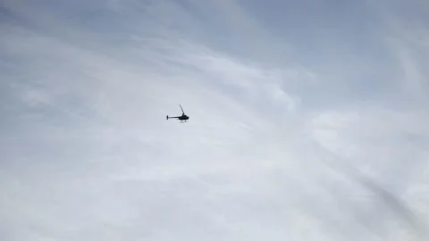 Helicopter flying over ocean Stock Footage 143807900