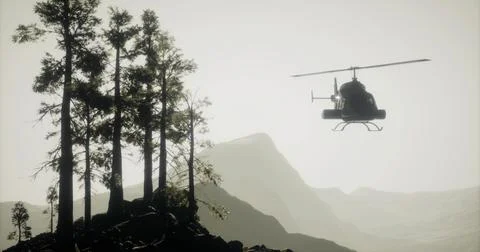 Helicopter flying over silhouettes of trees and mountains at dusk Ilustração Stock
