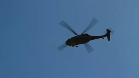 Helicopter flying overhead Stock Footage