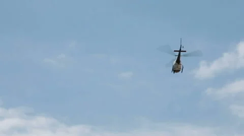 Helicopter Flying Overhead White Clouds Blue Sky Stock Footage 64143680