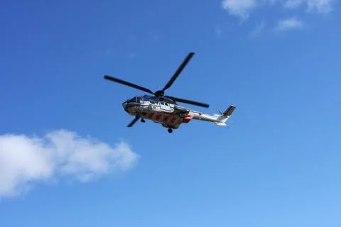 Helicopter flying Stock Photos