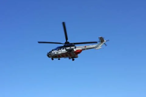 Helicopter flying Stock Photos