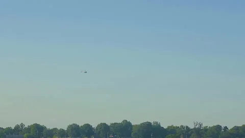 Helicopter Flying in the Sky Stock Footage 142143536