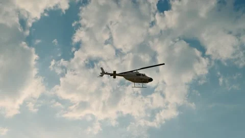 Helicopter flying in the sky Stock Footage 290999368
