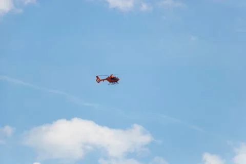 Helicopter flying in the sky Stock Photos