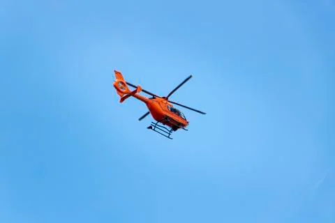 Helicopter flying in the sky Stock Photos