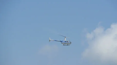 Helicopter flying in slow motion Stock Footage 29666587