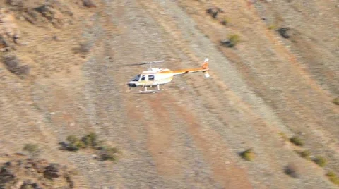 Helicopter Flying Through Canyon Stock Footage 12469335